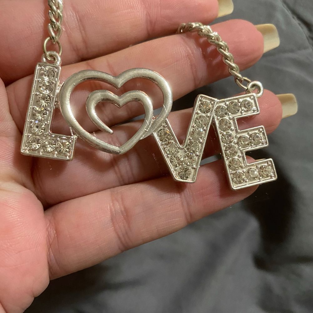 LOVE silver necklace , pair your items up with jeans , dresses, skirts , thigh h